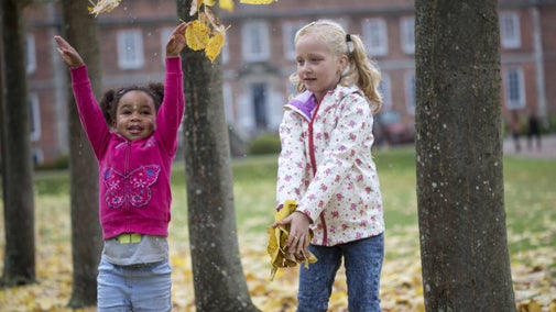 Children playing in the garden in October at Erddig, Clwyd.